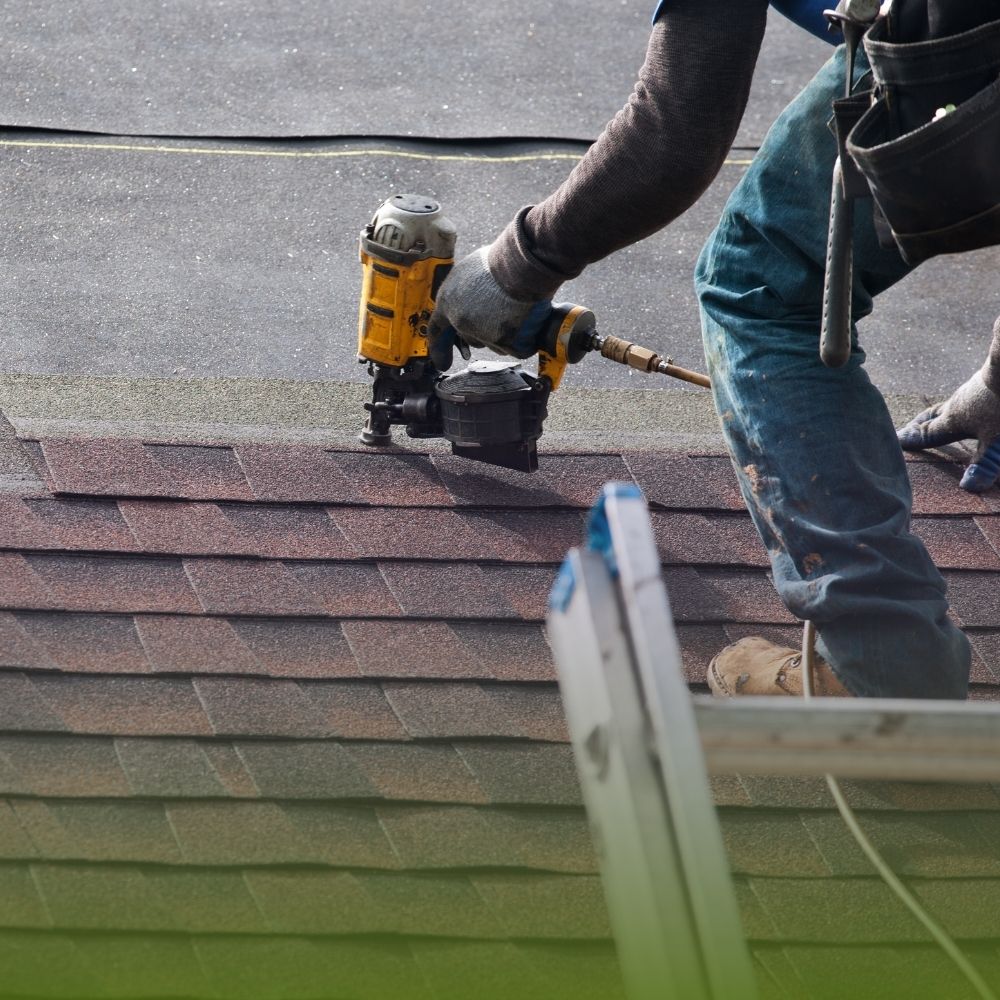 roofers installing new roof on house (1)